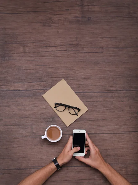 Man with cellphone and coffee — Stock Photo, Image