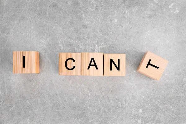 Wooden cubes with phrase I CANT — Stock Photo, Image