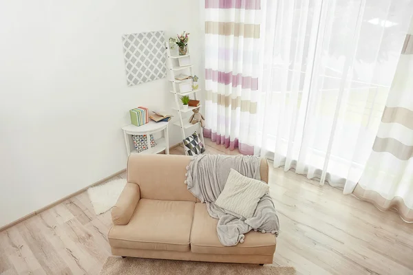 Living room interior with sofa, table and stand — Stock Photo, Image