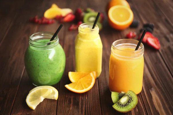 Refreshing fruit smoothie on table — Stock Photo, Image