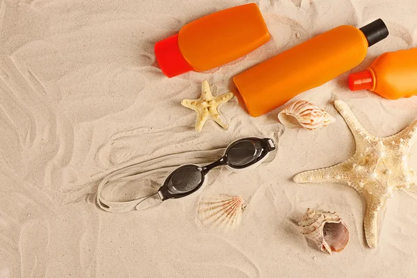 Beach accessories on sand — Stock Photo, Image
