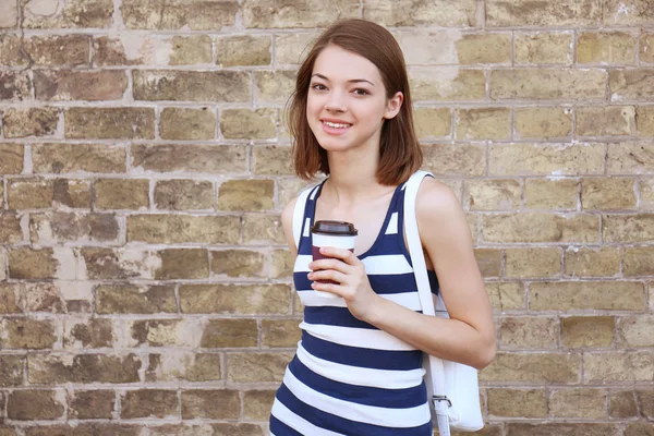 Chica joven con café — Foto de Stock