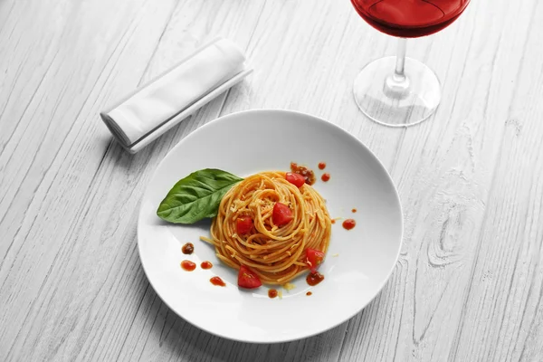 Portion of tasty pasta on served table — Stock Photo, Image