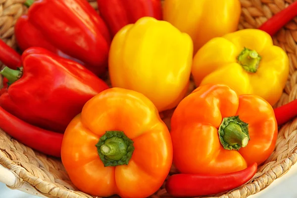 Fresh peppers in a basket — Stock Photo, Image