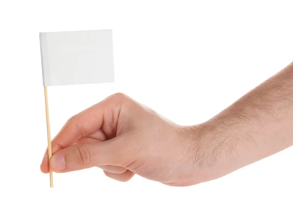 Hand som håller vit flagga — Stockfoto