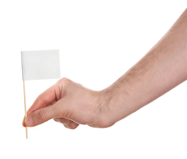 Hand som håller vit flagga — Stockfoto