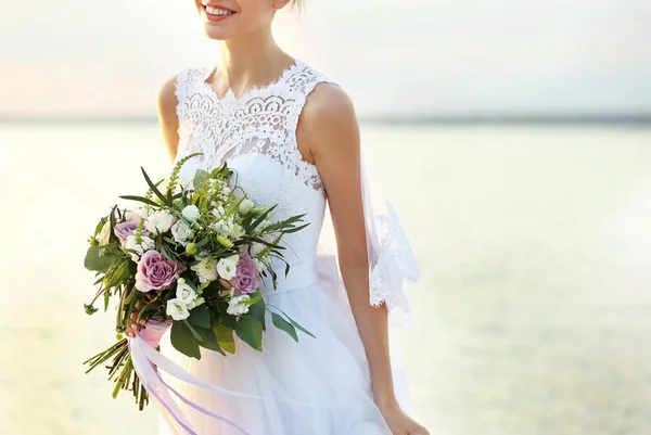 Bride with beautiful bouquet — Stock Photo, Image