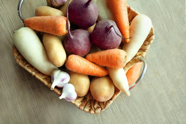 Root vegetables in basket — Stock Photo, Image