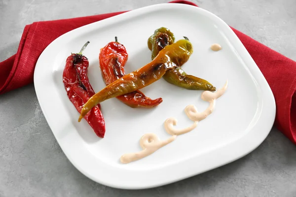 Plate with roasted peppers