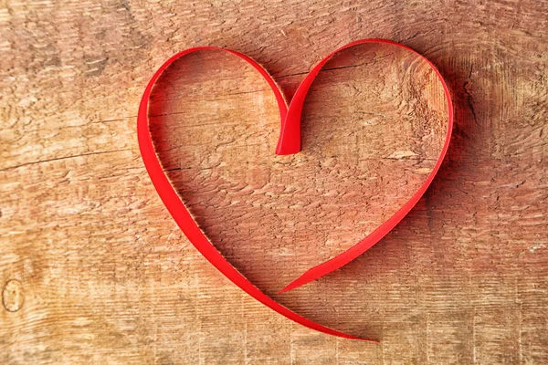 Heart shaped red ribbon — Stock Photo, Image