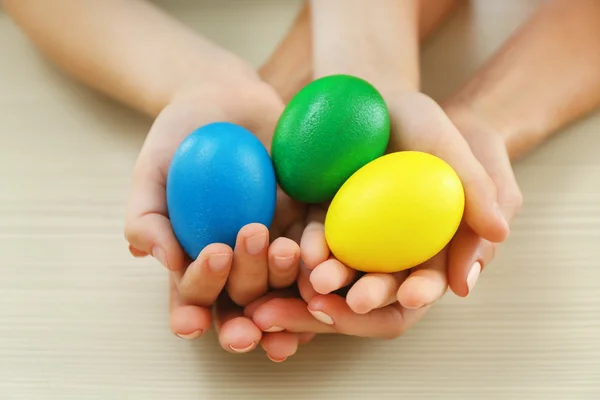 Mother and daughter holding Easter eggs — Stock Photo, Image