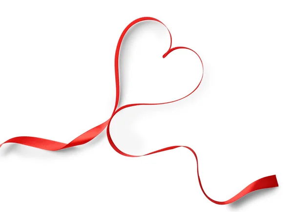 Red ribbon in shape of heart — Stock Photo, Image