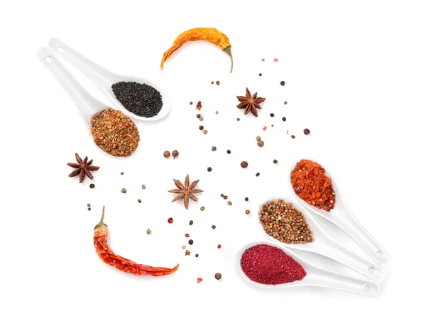 Different spices in spoons — Stock Photo, Image