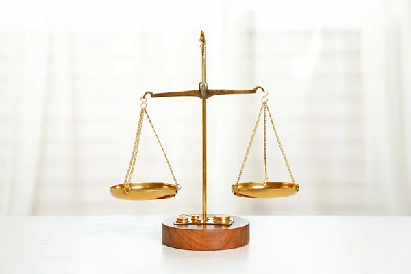 Law scales on a table — Stock fotografie