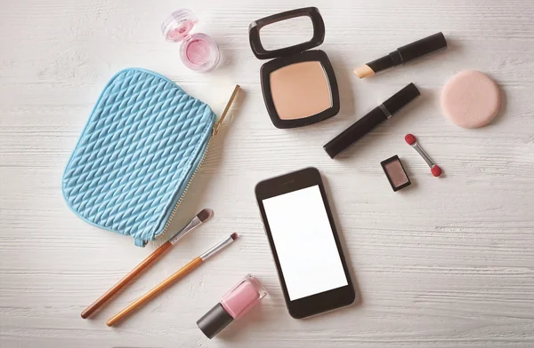 Phone and cosmetics background — Stock Photo, Image