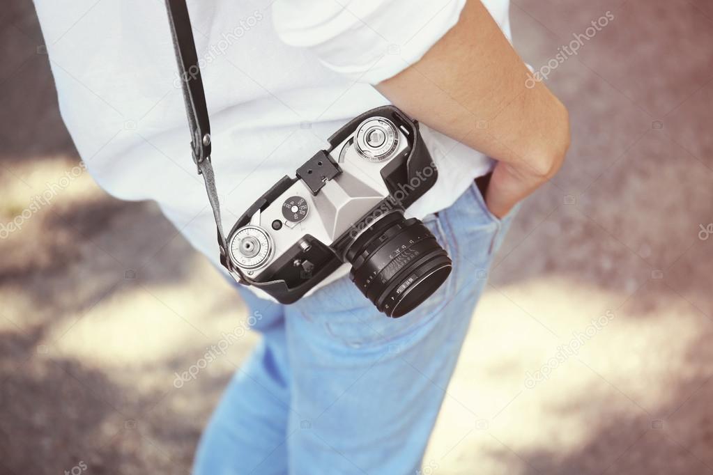 Woman with vintage camera