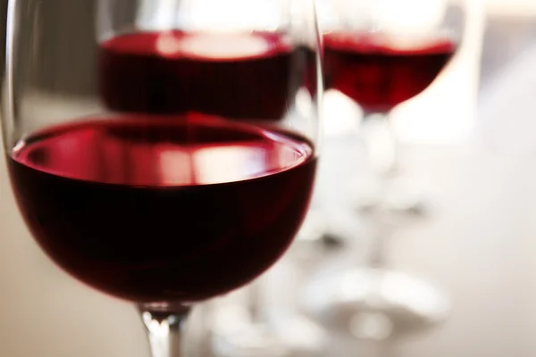 Glass of red wine on table in restaurant, closeup — Stock Photo, Image