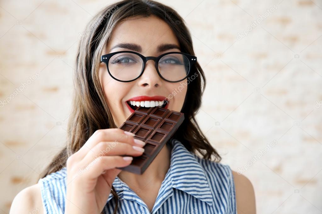 girl eating chocolate 