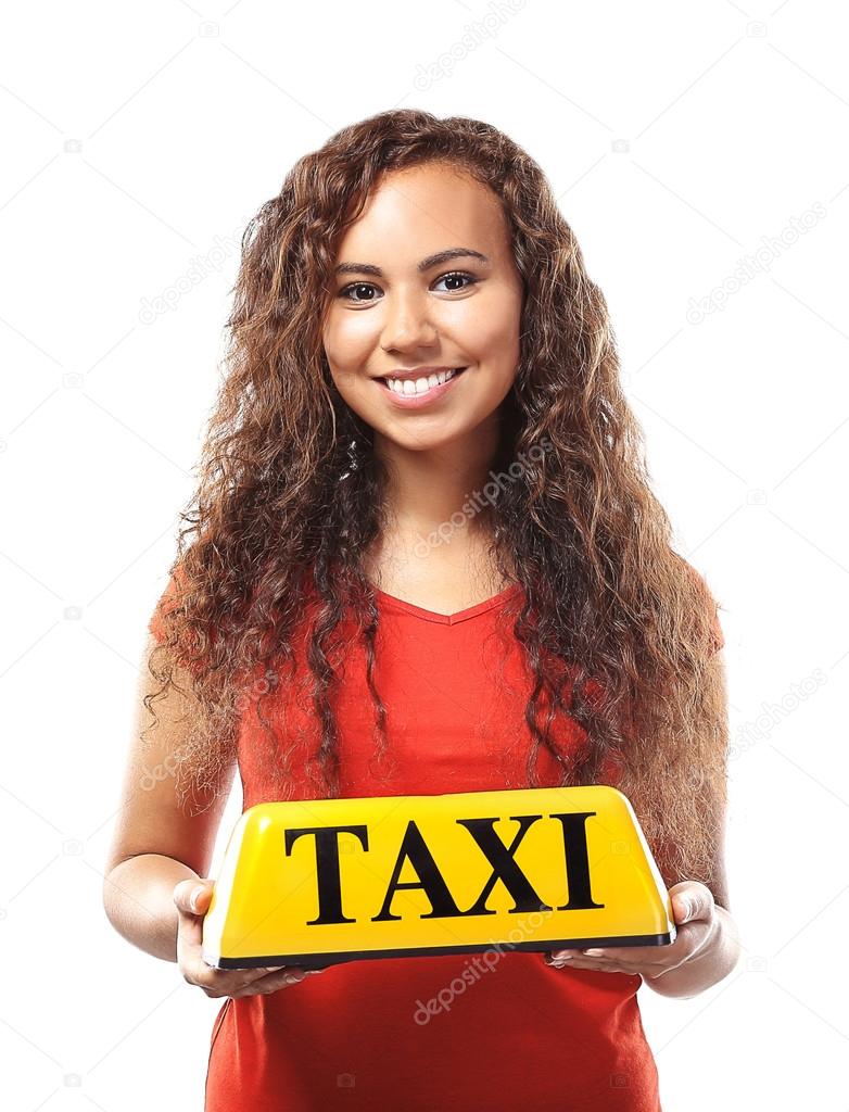 girl holding taxi roof light