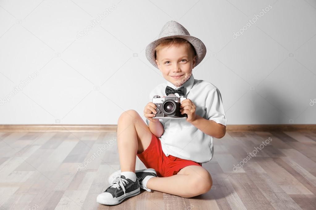 boy with vintage camera