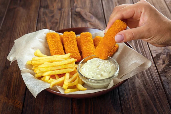 Holding tasty fish nugget — Φωτογραφία Αρχείου