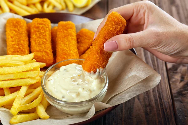 Holding tasty fish nugget — Φωτογραφία Αρχείου