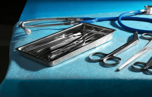 Surgery instruments on operating table — Stock Photo, Image