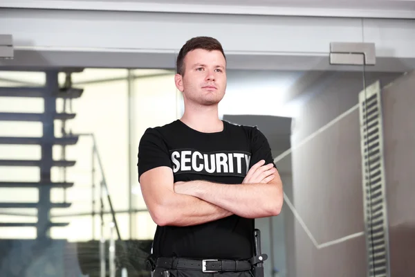 Security man standing back — Stock Photo, Image