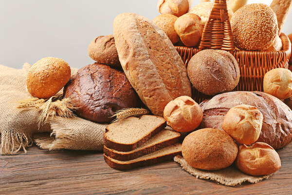 Fresh bread on wooden table