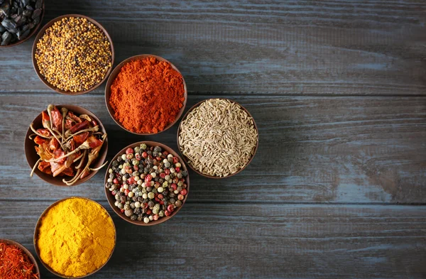 Different spices in bowls — Stock Photo, Image