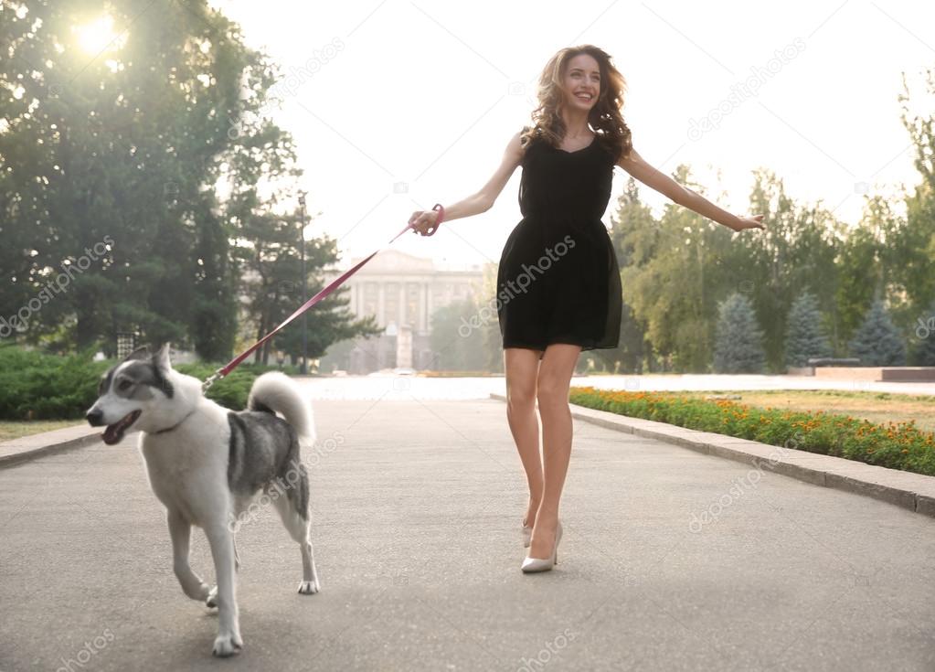  woman walking with dog