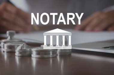 Noter. Metal mürekkep yastıkları ve noter tablo karnesiyle