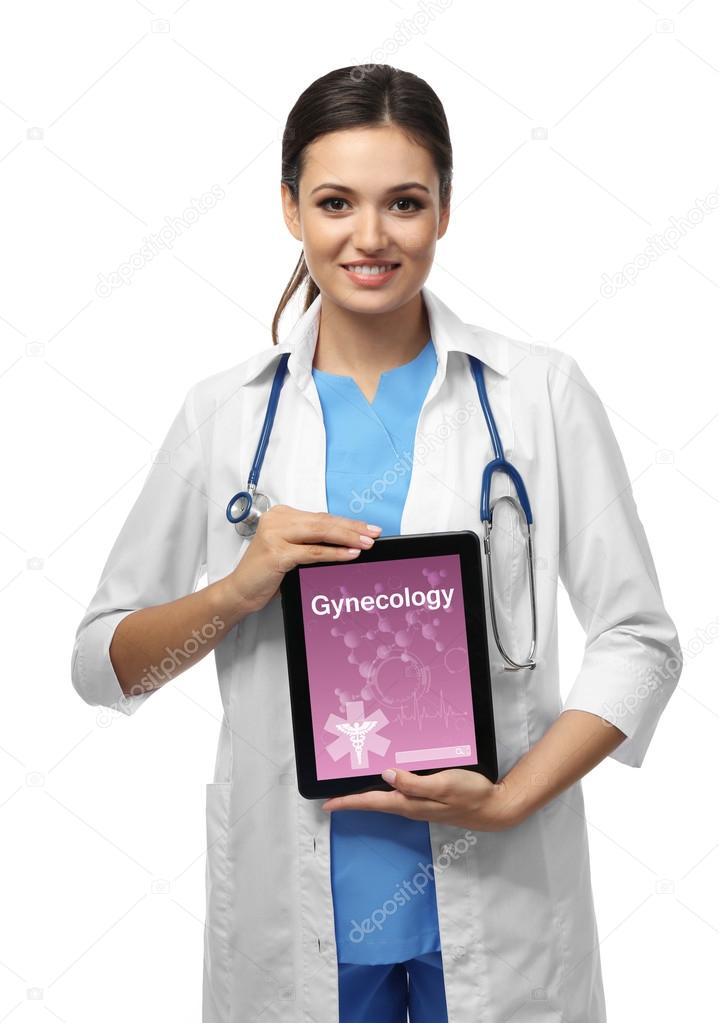 Smiling doctor holding a tablet isolated on white. Gynecology concept