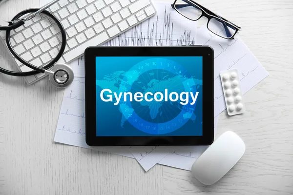 Medical tablet and equipment. Gynecology concept — Stock Photo, Image