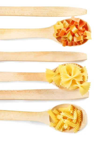 Wooden spoons with pasta — Stock Photo, Image