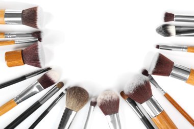 Make up brushes on white background clipart