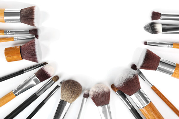 Make up brushes on white background