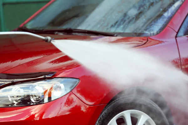 Coche de limpieza con agua a alta presión —  Fotos de Stock