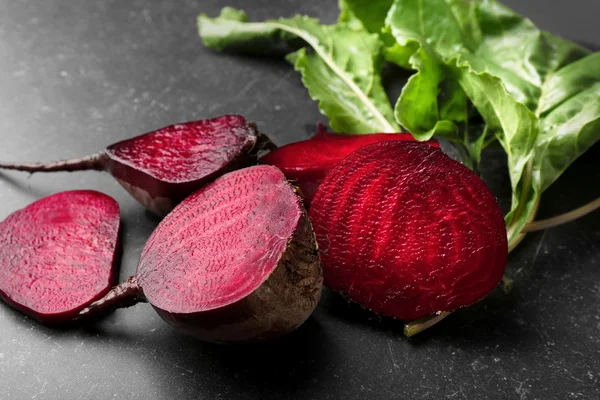 Fresh beetroots with tops on grey background — Stock Photo, Image