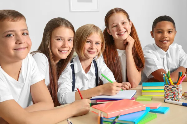 Schoolchildren Drawing While Sitting Table Classroom — Stock Photo, Image