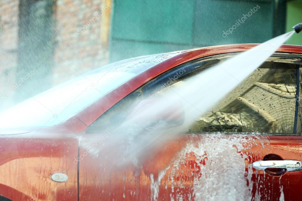 Cleaning car with high pressure water