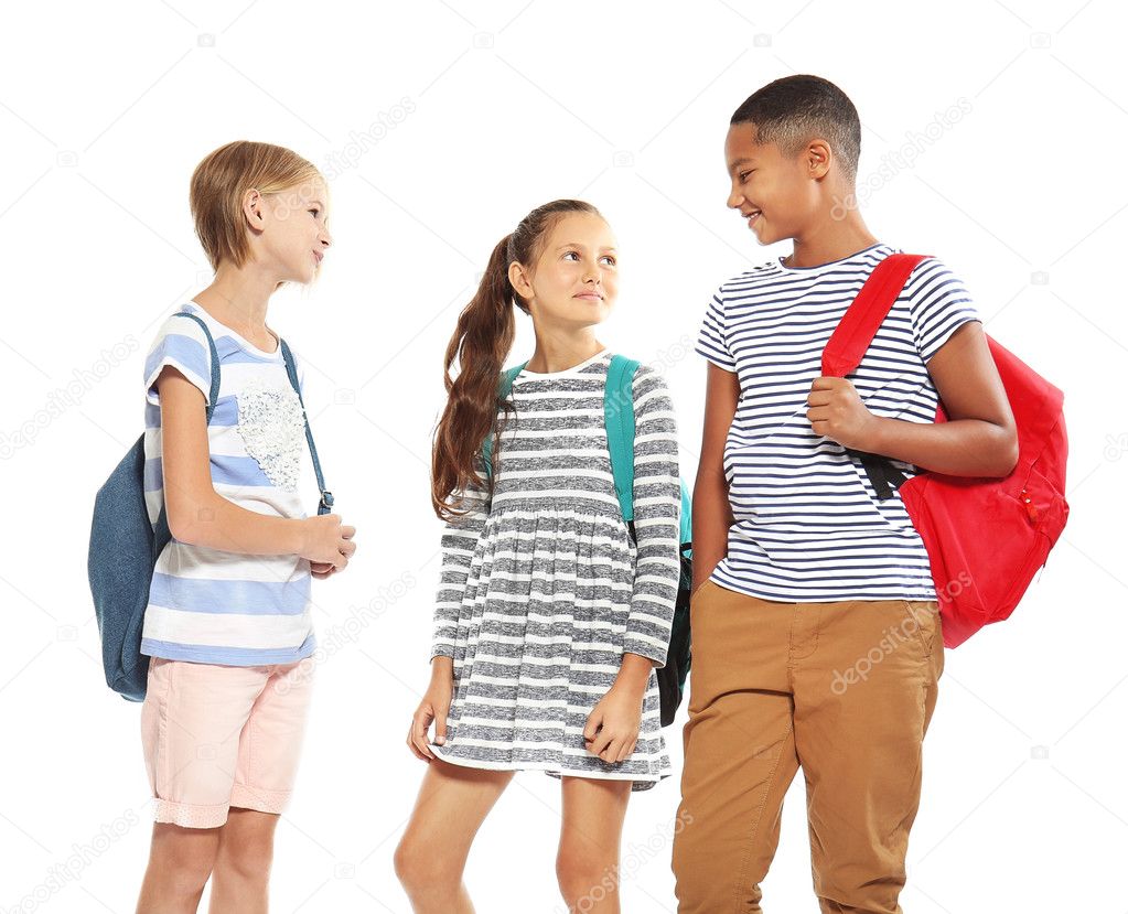 Cute schoolchildren, isolated on white