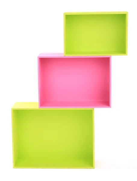 Caixas de madeira multicoloridas sobre fundo branco isolado — Fotografia de Stock