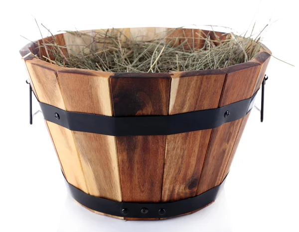 Big wooden basket full of dried grass isolated on white — Stock Photo, Image