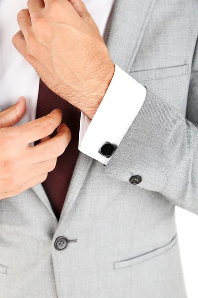 Hombre haciendo atar aislado en blanco — Foto de Stock