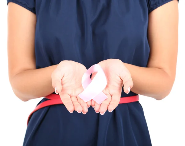 Donna con aiuti consapevolezza nastro rosa in mani isolate su bianco — Foto Stock