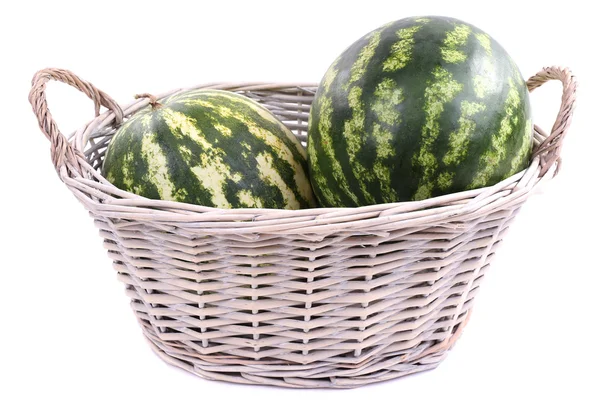 Wassermelonen im Korb isoliert auf weiß — Stockfoto