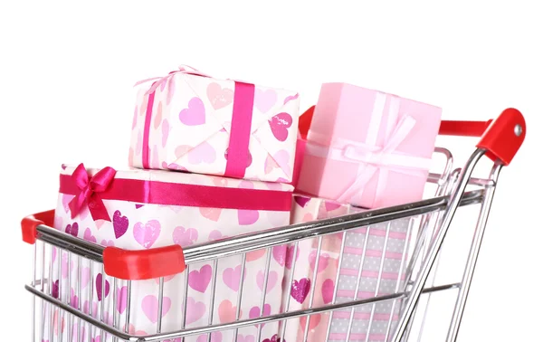 Muchas cajas presentes en el carrito de la compra aisladas en blanco — Foto de Stock