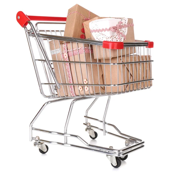 Many present boxes in shopping cart isolated on white — Stock Photo, Image