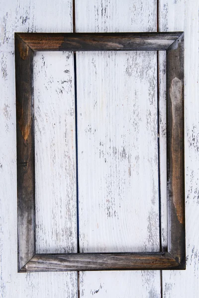 Vintage frame on wooden background — Stock Photo, Image